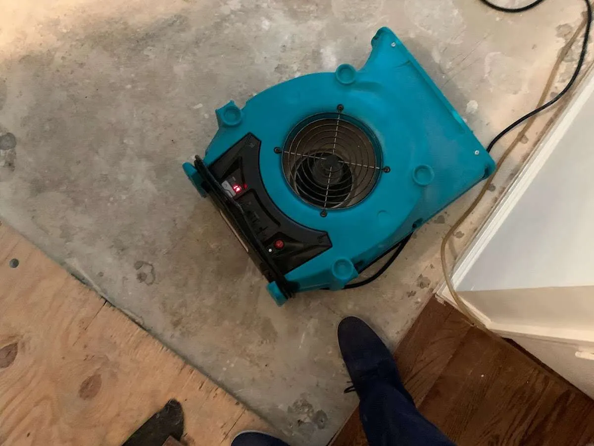 Air mover drying subfloor during Leak Detection & Repair in Loma Linda